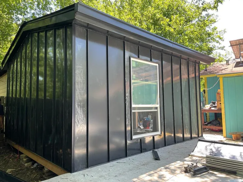 Black standing seam metal wall panels for Metal Roof Installation in Wilton